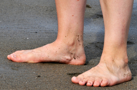 Bare feet on the beach